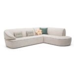 momo γωνιακός καναπές σε ύφασμα με στρογγυλεμένες γραμμές