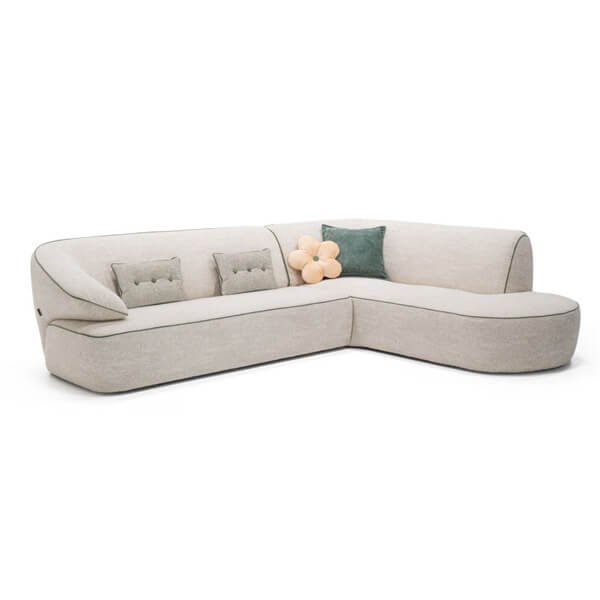 momo γωνιακός καναπές σε ύφασμα με στρογγυλεμένες γραμμές